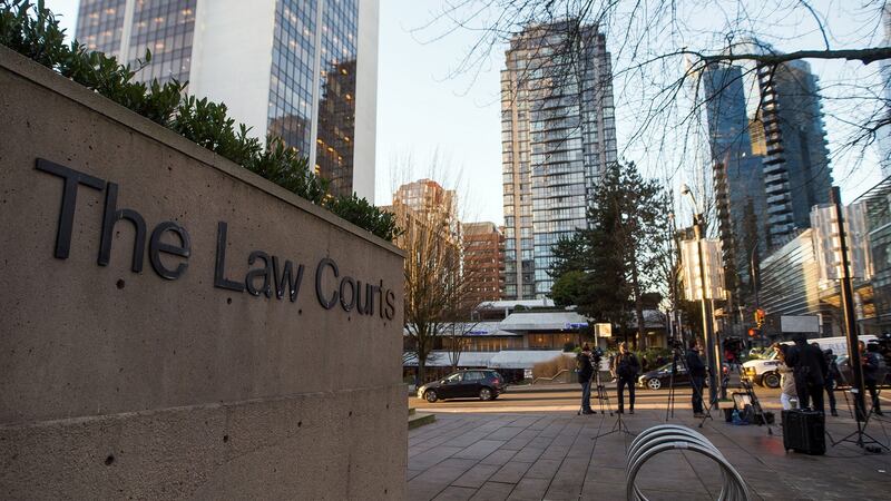 Members of the media stand outside the Supreme Court In Vancouver ahead of Meng Wanzhou’s bail hearing. Photograph: Bloomberg