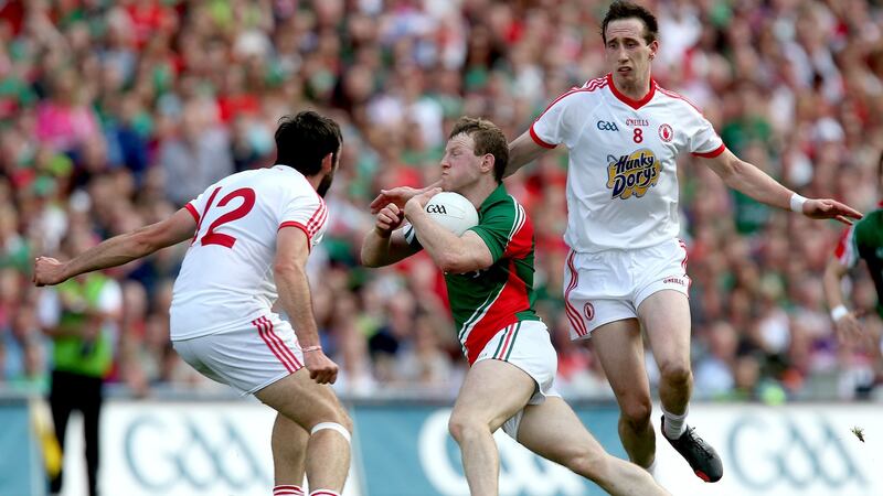 Joe McMahon and Colm Cavanagh against Mayo in 2013. Inpho