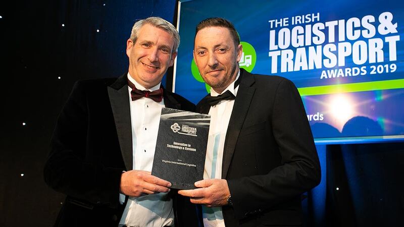 Ciarán Miller, Managing Director, Linde Material Handling Ireland presents the Innovation in Technology & Systems award to Gerry Murphy, Virginia International Logistics.