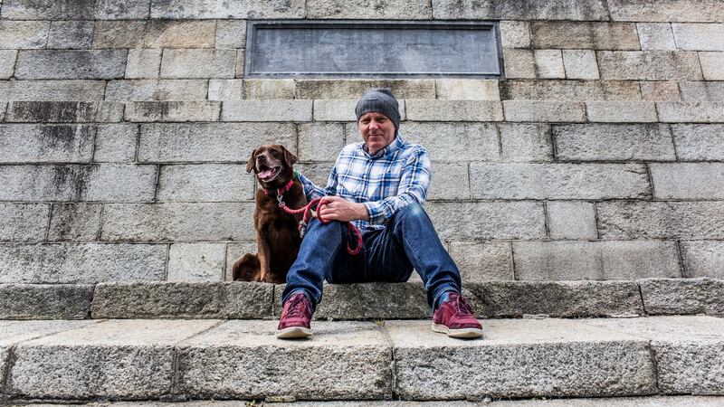 Conal McMenamin and his dog Daisy are seen in the Phoenix Park. Photograph: James Forde