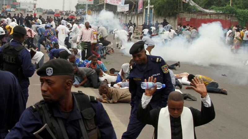 Riot policemen fire tear gas to disperse Catholic priests and demonstrators during a protest against President Joseph Kabila, organised by the local Catholic Church in Kinshasa, Democratic Republic of Congo, January 21st, 2018. Photograph: Kenny Katombe/Reuters