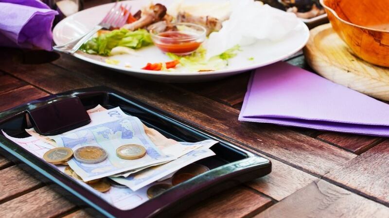 Workers’ tips will be protected under a new law to be drawn up in the coming months. Photograph: iStock