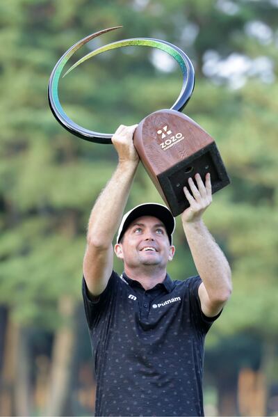 Keegan Bradley lifts the trophy after winning the ZOZO Championship at Accordia Golf Narashino Country Club in Inzai, Chiba, Japan. Photograph: Chung Sung-Jun/Getty Images