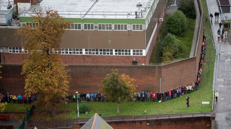 Artist Linda Saul organised a ‘Reading Gaol Hug’ where hundreds of people formed a circle around the site to demonstrate what it means to them. Photograph: Roger Askew