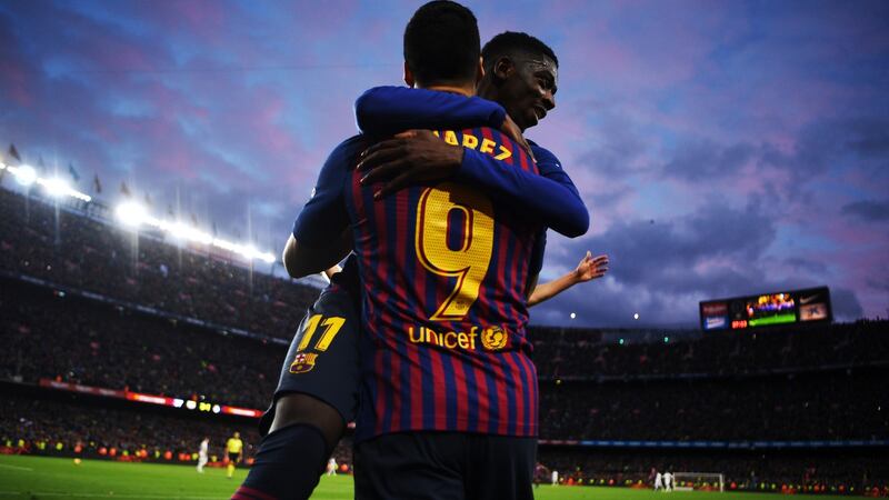 Luis Suarez celebrates with Ousmane Dembélé  after scoring the fourth goal against Real Madrid in the La Liga game at the Camp Nou on October 28th. Photograph:  David Ramos/Getty Images
