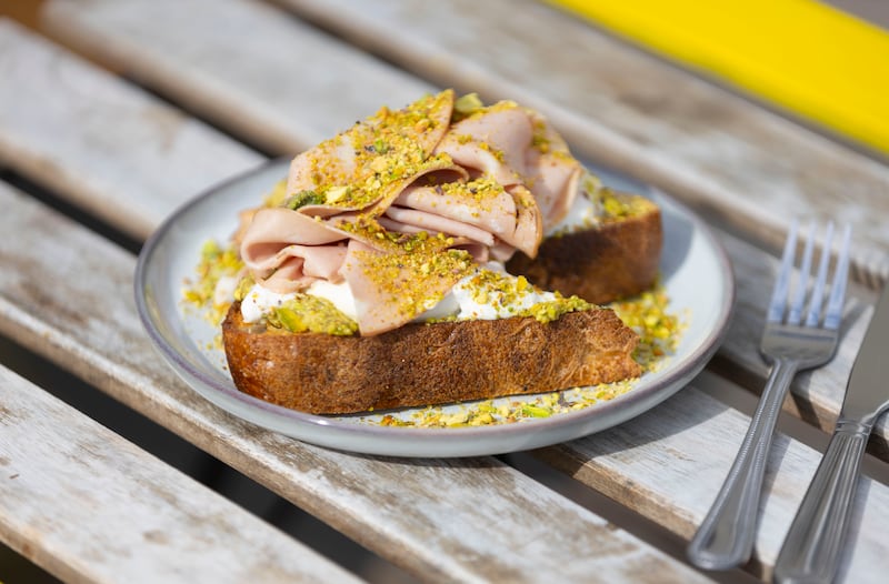 Grilled Seagull Bakery sourdough topped with pistachio cream, burrata and mortadella