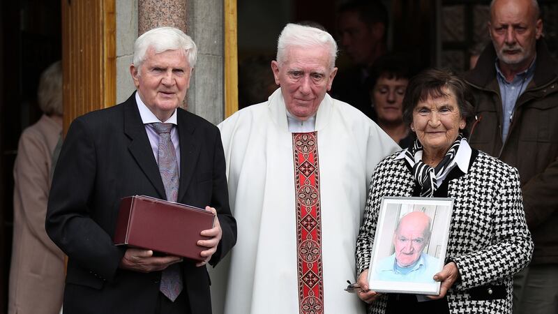 Brian Boylan(L) , Fr Dennis Kennedy (C) and Margaret Browne (R)after the ceremony. Photograph Nick Bradshaw/ The Irish Timess