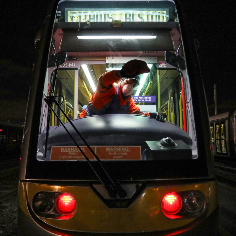 Luas cleaning teams working at Transdev’s Red Cow depot. Photograph: Crispin Rodwell
