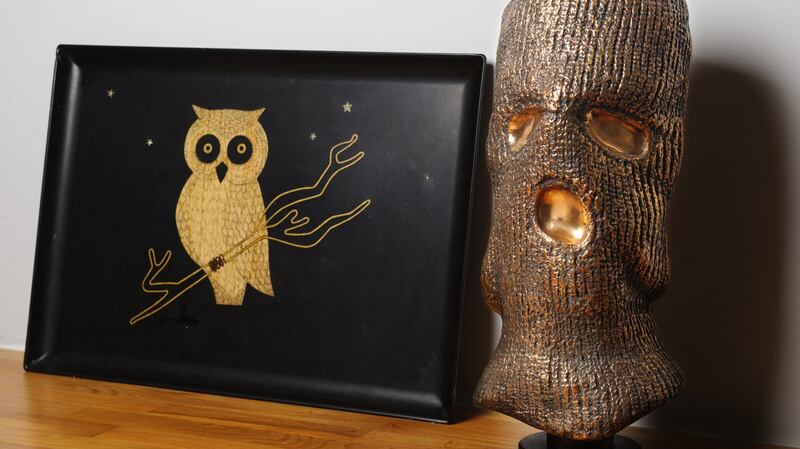 Niamh McCann’s bronze balaclava beside a tray given to McCann by a friend. Photograph: Eoin Rafferty
