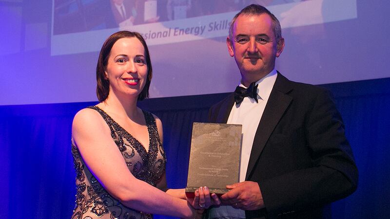 Suzanne Ryan, Financial Controller, Actavo presents the Excellence in Education & Training Award to Cormac Allen, Dublin Institute of Technology.