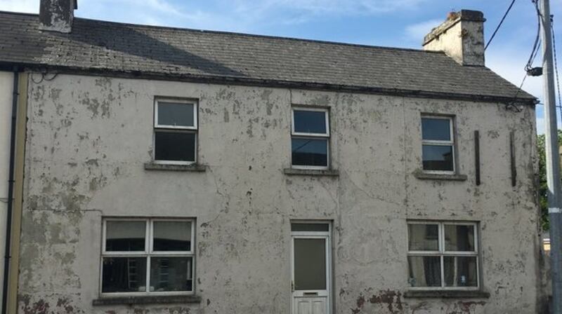 On Pound Street, Ballaghaderreen an end of terrace fourbedroom house for sale at €49,000