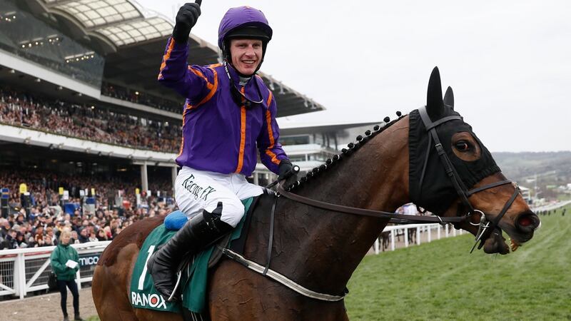 Paul Townend celebrates winning the 2.10 Randox Health County Handicap Hurdle on Arctic Fire at the Cheltenham Festival. Photo: Stefan Wermuth/Reuters