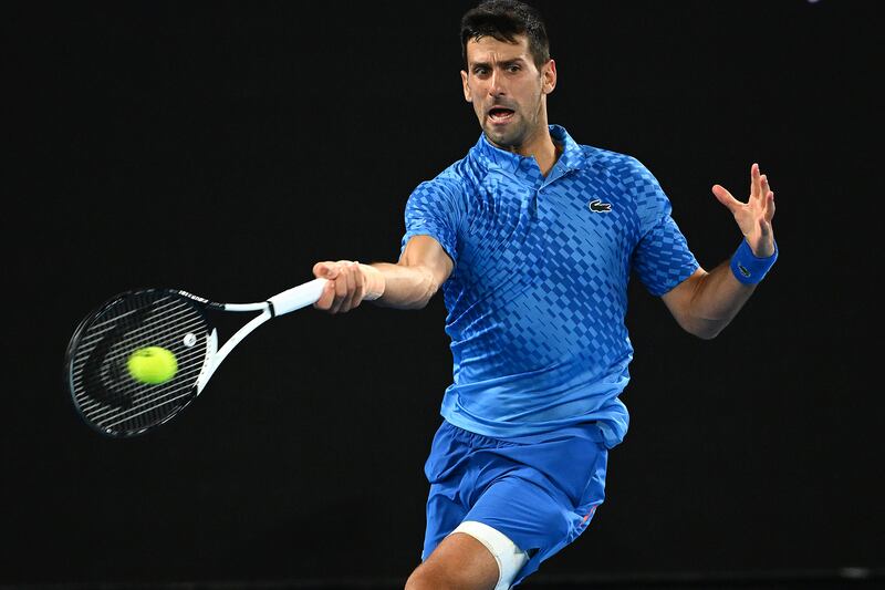 Novak Djokovic of Serbia plays a forehand against Grigor Dimitrov of Bulgaria. Photograph: Quinn Rooney/Getty