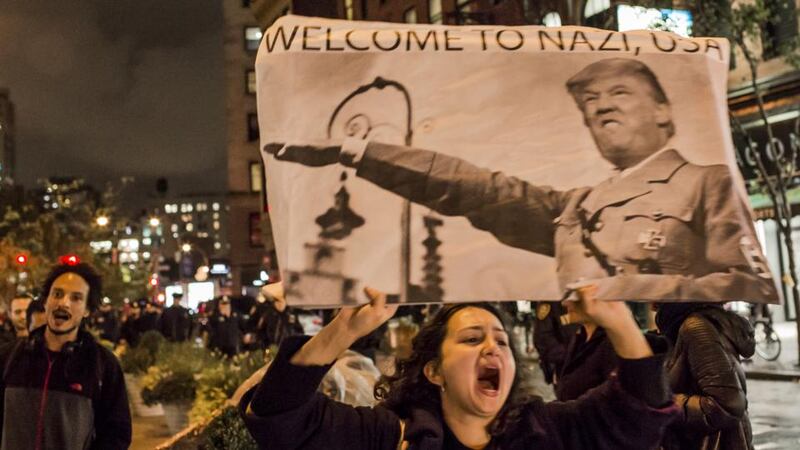 Protesters on their way to Trump Tower: understanding the past, writes Timothy Snyder, gives us the chance “to be responsible: not for everything, but for something”. Photograph: Michael Nigro/Pacific Press/LightRocket via Getty