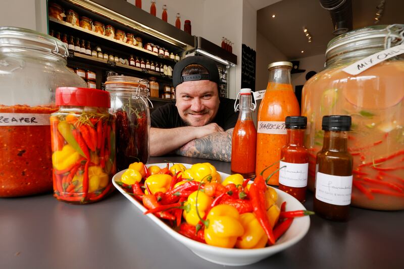 Valentin Ivancenco of Fairmental with a selection of his fermenting chilli hot sauce at 10 Grand Canal Street. Photograph: Alan Betson
