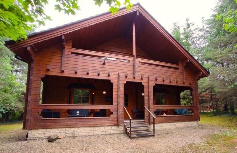 8 River Valley has a large front porch with space for tables and seating