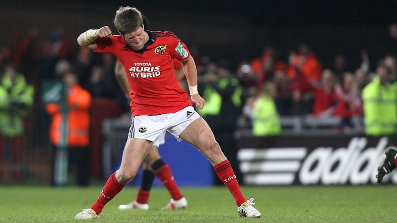 Munster’s Ronan O’Gara celebrates a drop goal in the last second to win the game against Northampton in  Thomond Park, Limerick in November 2011. Photograph: Ryan Byrne/Inpho