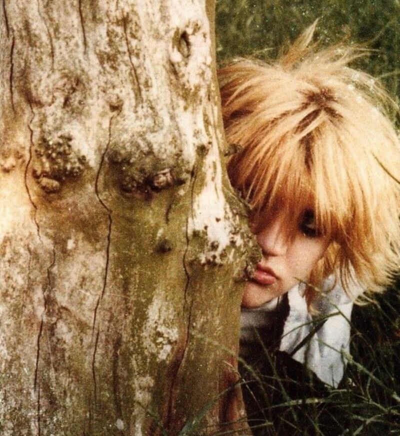 Courtney Love in Sefton Park, in Liverpool, around 1982. Photograph: Robin D Bradbury/Confingo