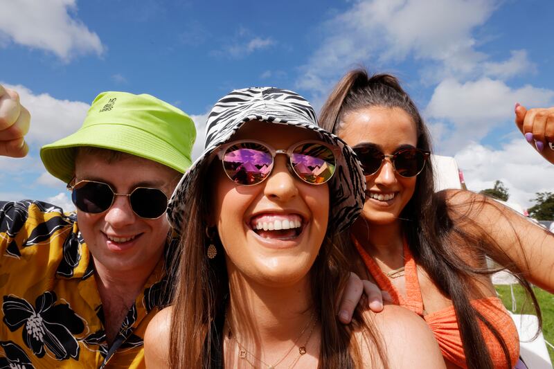 James Sweeney, Grace McCarthy and Sophie McCarthy from Johnstown, Co Kilkenny, enjoying the sunshine at the Electric Picnic. Photograph: Alan Betson/The Irish Times

