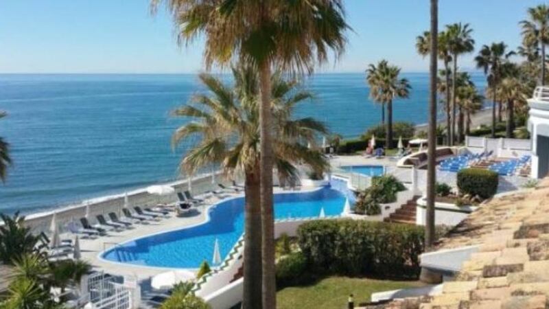 Spain: this Estepona house is in a front-line beach development that has three swimming pools and a gym