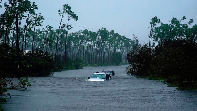 Cars sit submerged in water from Hurricane Dorian in Freeport, Bahamas on Tuesday. Photograph: AP
