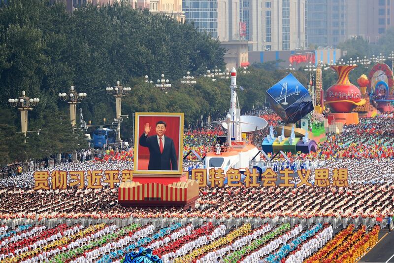 Performers take part in the parade on Tiananmen Square. Photograph: EPA/How Hwee Young