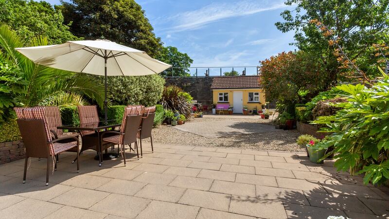 Back garden with shed at end