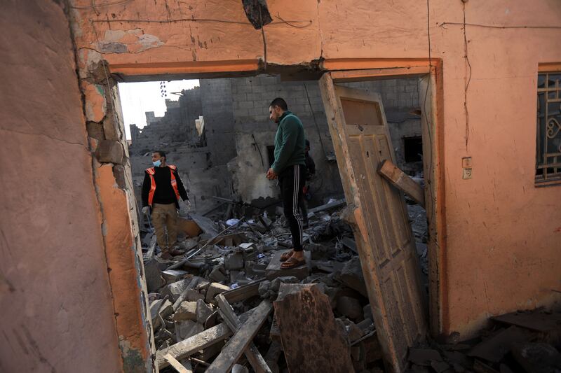 A destroyed home in Khan Younis. Photograph: Yousef Masoud/The New York Times
                      