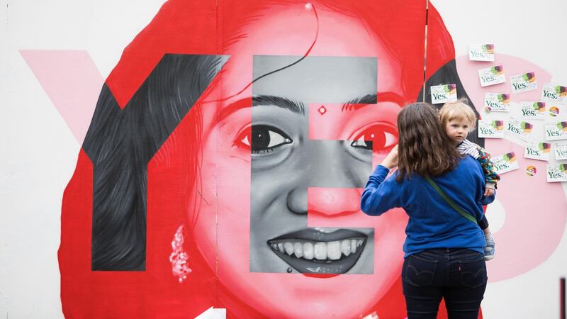 Maria Golpe and her daughter Sabela Golbe Andrews pictured at the Mural of Savita Halappanavar. Photograph: Tom Honan/The Irish Times