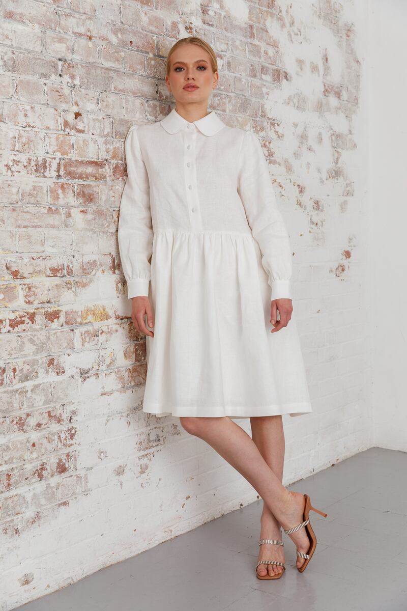 White linen shirt dress with gathered skirt and pockets €295