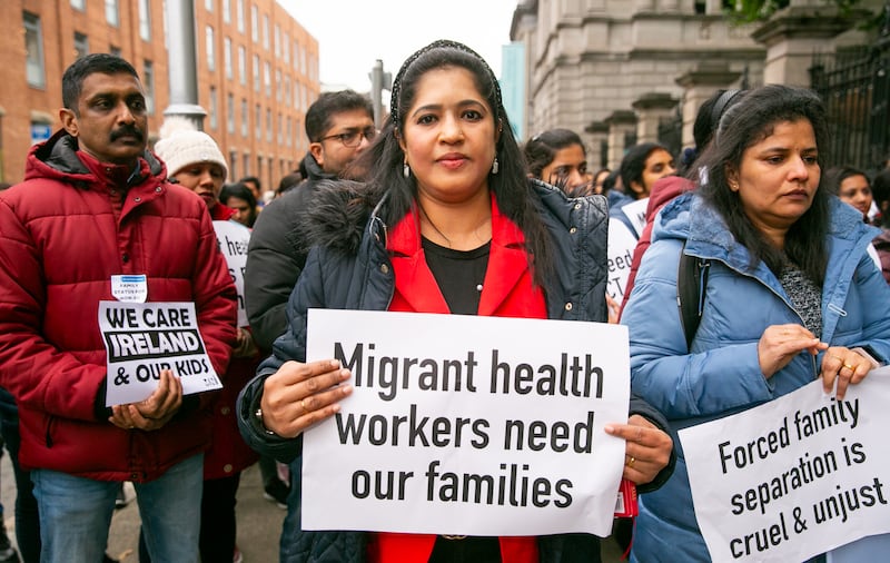 Shiji Joseph from Kerala in India at a migrant healthcare workers protest outside the Department of Justice in Dublin against the fact that the current family reunion policy denies them the right to bring their spouses or children to Ireland. Photograph: Gareth Chaney/Collins
