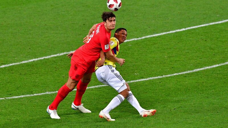 England defender Harry Maguire  vies with Colombia’s midfielder Mateus Uribe during the   World Cup Round of 16 match at the  Spartak Stadium in Moscow. Photograph: Mladen Antonov/AFP/Getty Images