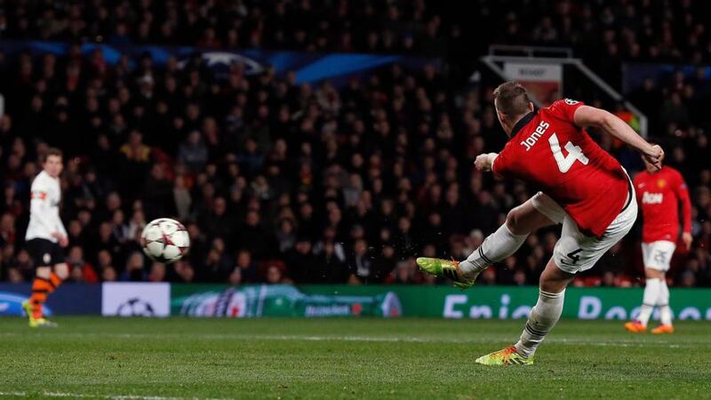 Manchester United’s Phil Jones  shoots to score  against Shakhtar Donetsk at Old Trafford. Photograph: Phil Noble/Reuters