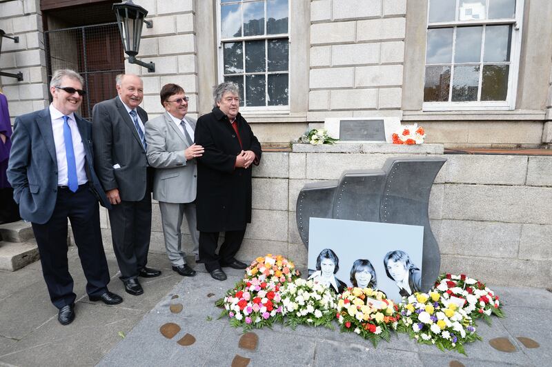 Stephen Travers (bass player), Brian Maguire (road manager), Des Lee (saxophone player) and Ray Miller (drummer) of the original Miami Showband at a wreath-laying ceremony organised by Justice for the Forgotten at Parnell Square, Dublin, in 2015. Photograph: Eric Luke