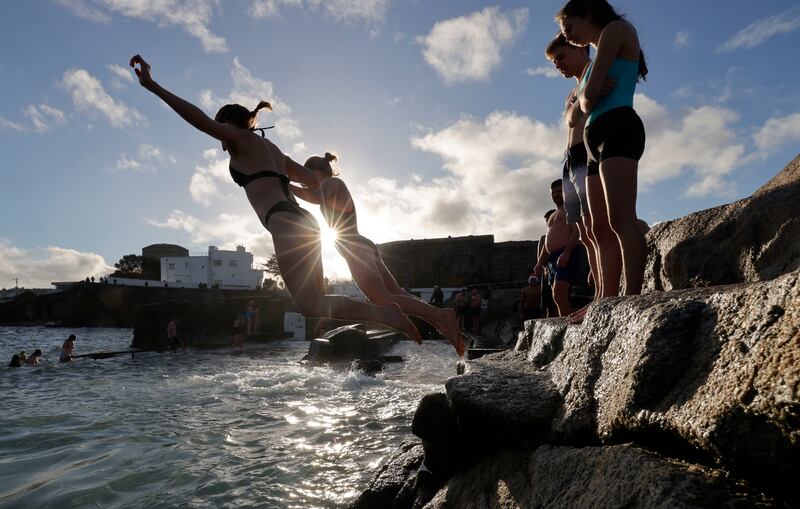 Swimmers take to the water at the 40 Foot in Dublin for a Christmas Day  dip. Photograph: Alan Betson 
