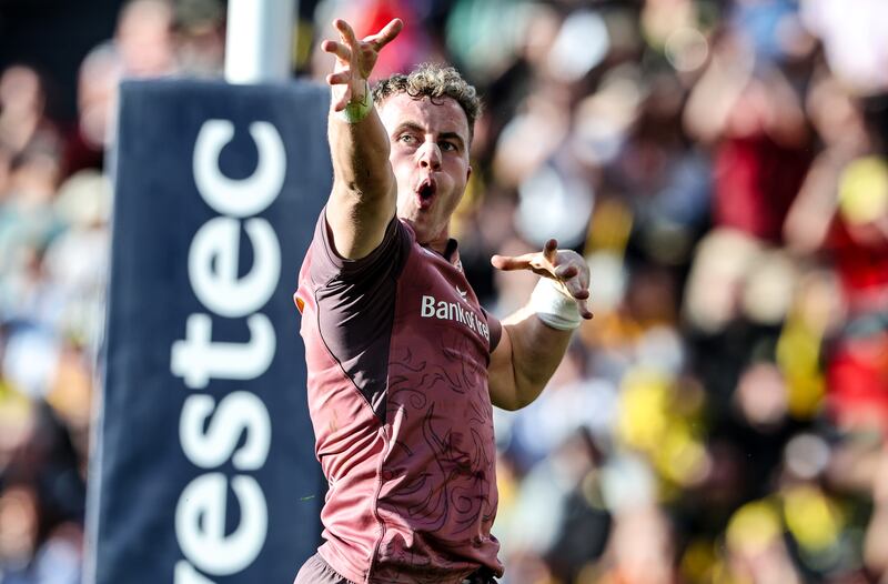 Munster's Craig Casey celebrates scoring a try against La Rochelle in April. Photograph: Billy Stickland/Inpho