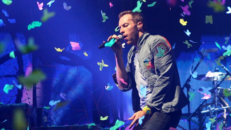 Chris Martin of Coldplay performs at the Glastonbury Festival at Worthy Farm, Pilton in 2011. A spokesman for MCD said there is currently no second date planned, despite the band announcing second dates in Brussels, Gothenburg, Cariff and Paris this morning.  Photograph: Dave Hogan/Getty Images