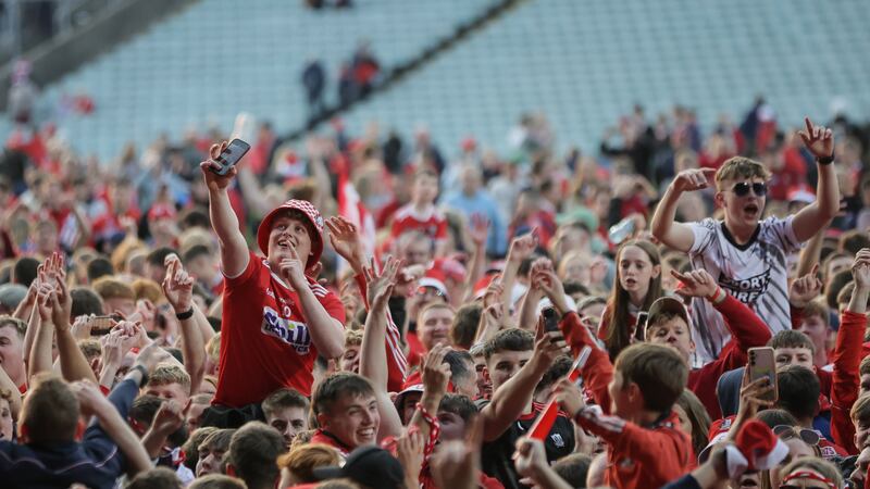 Cork fans celebrate on the pitch after the Munster final victory over Limerick. Photograph: Laszlo Geczo/Inpho