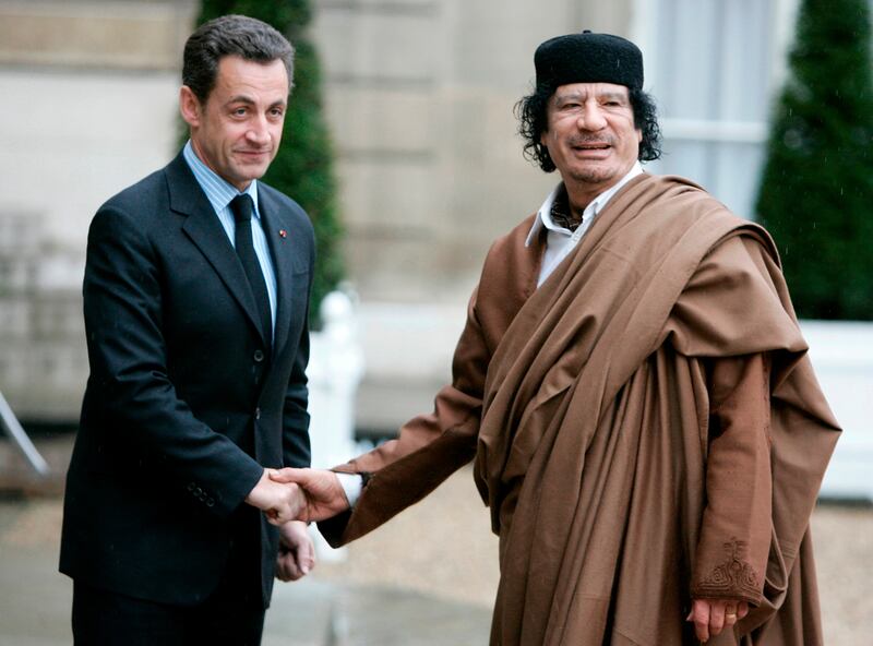 Nicolas Sarkozy greeting Libyan leader Muammar Gadafy at the Élysée Palace in 2007. Photograph: Francois Mori/AP