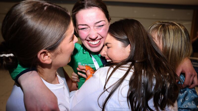 Boxer Lisa O’Rourke meeting her family after arriving back at Dublin Airport. Photograph: Dara Mac Donaill / The Irish Times