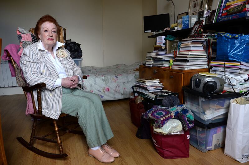 Mae Robbins surrounded by her possessions in her home in Phibsborough, Dublin in May while facing eviction as the landlord is selling the property. 
Photograph: Dara Mac Donaill / The Irish Times