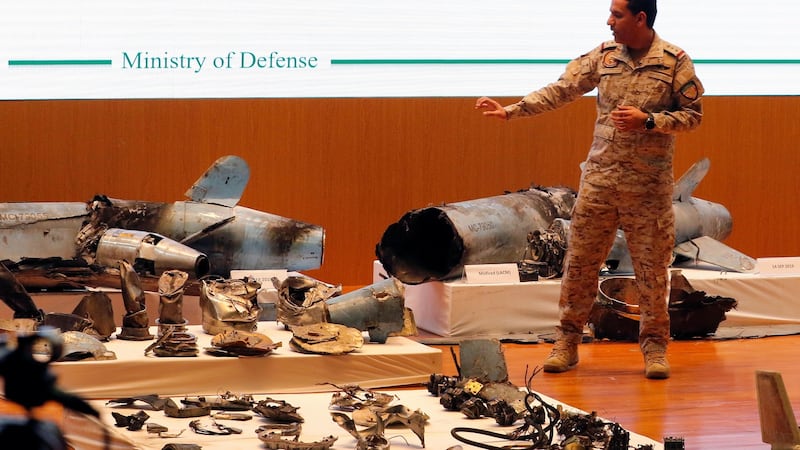 Saudi defence ministry spokesman Col Turki Al-Malik  addresses a press conference next to missile parts in  Riyadh on Wednesday. Photograph: EPA