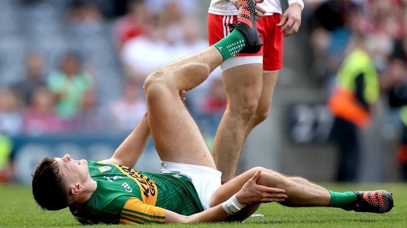 David Clifford goes down with cramp during the semi-final at Croke Park. Photograph: James Crombie/Inpho