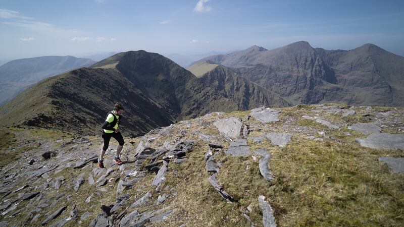 Paddy O’Leary running up Maolán Buí in the MacGillycuddy’s Reeks  in Co Kerry last April. Photograph: Ryan Scura