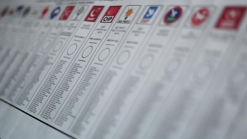 A  ballot paper is seen with party signs during Turkey’s general election at a polling station in Istanbul. Photograph: Ozan Kose/AFP/Getty Images.