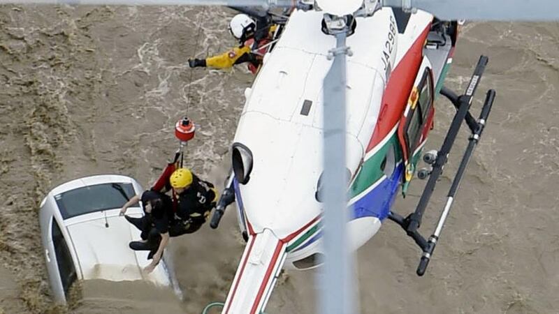 Up to 12 military helicopters took part in the rescue. Photograph: Reuters