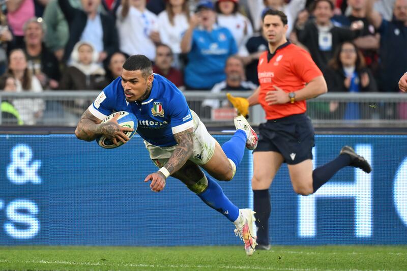 Italy’s Monty Ioane scores a late try during the Six Nations game against  England at Stadio Olimpico in Rome. Photograph: Giuseppe Fama/Inpho