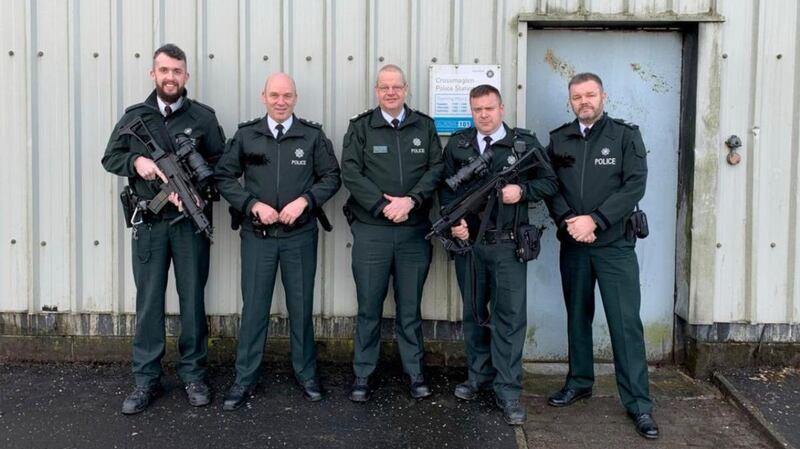 Chief constable Simon Byrne (centre) poses with heavily-armed PSNI officers outside Crossmaglen police station on Christmas Day last year. Photograph via Twitter
