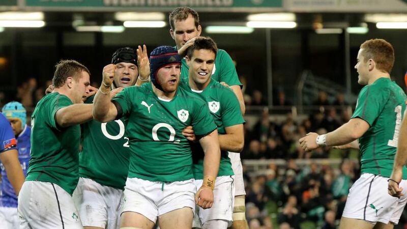 Ireland players congratulate  tryscorer Seán O’Brien at the Aviva Stadium. PhotogJames Crombie