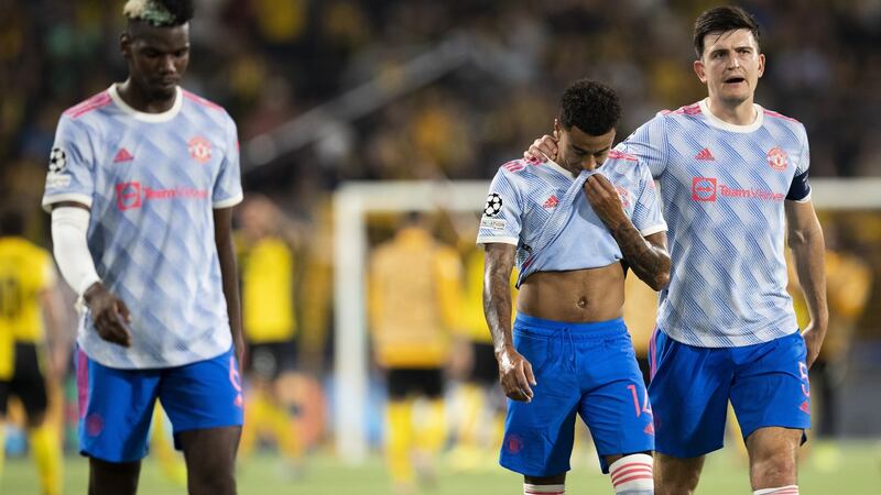 Jesse Lingard is consoled by Manchester United Harry Maguire after the mistake that led to Young Boys’ late winner in Berne. Photograph: Peter Klaunzer/EPA